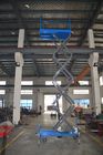 El móvil hidráulico Scissor la elevación 6 metros de altura de la plataforma capacidad de cargamento de 1 tonelada para la sala de exposiciones